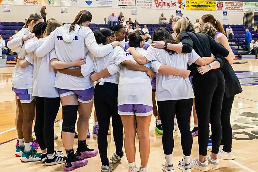 YHC Women's Basketball Team Huddle